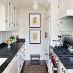 paintings in the interior of a small kitchen